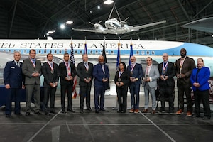 Photo of all ten AFRL Fellow recipients standing with both AFRL Commander Brig. Gen. Jason Bartolomei and AFRL Chief Technology Officer Dr. Kath-Anne Soderberg.