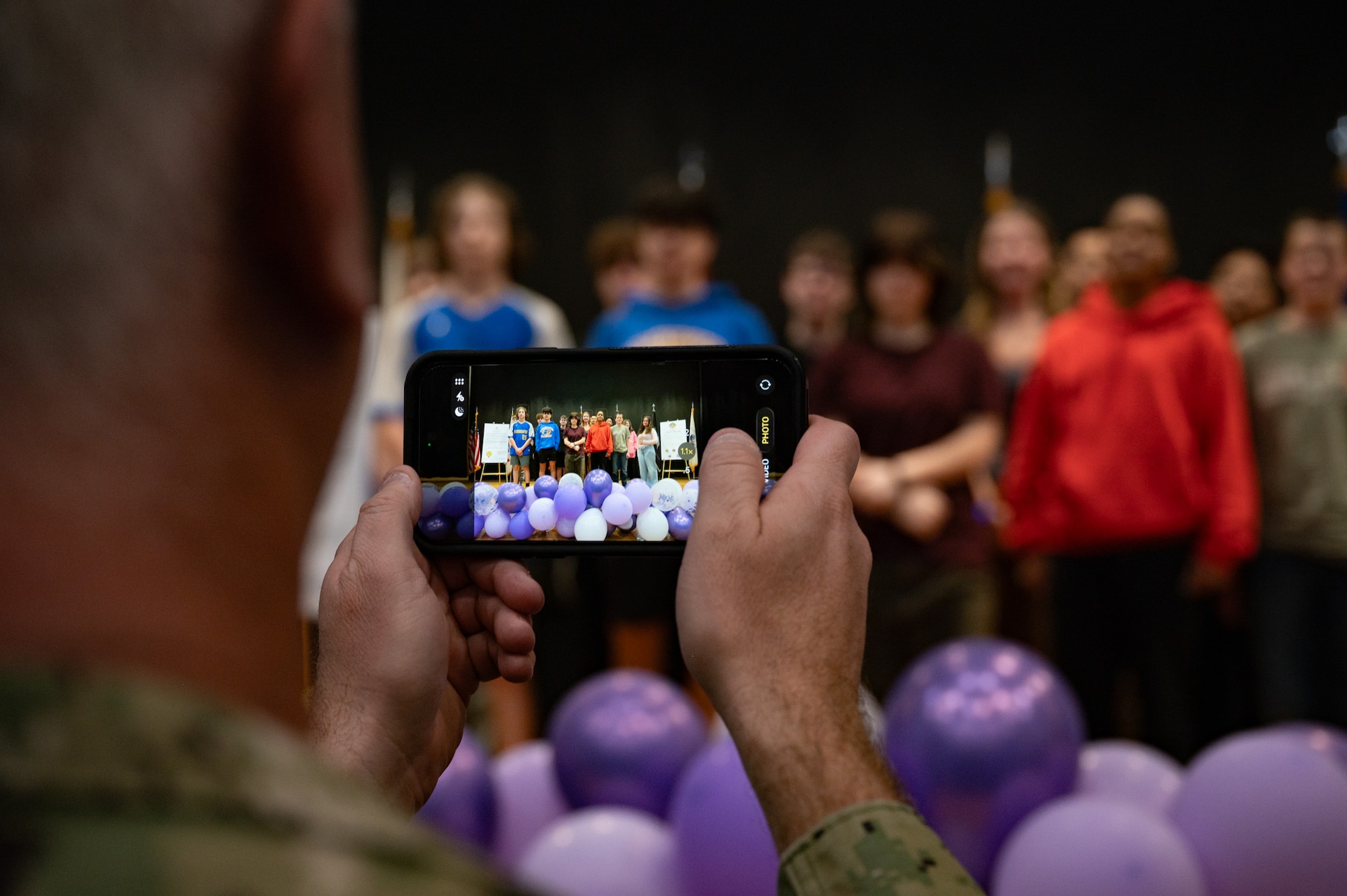 Students pose for a picture after the Month of the Military Child Proclamation signing at Joint Base McGuire-Dix-Lakehurst, N.J., April 1, 2026. Each year the Department of War partners with national, state and local governments, schools, military organizations, private companies and citizens to celebrate military children and the unique challenges they may face. (U.S. Air Force photo by Airman 1st Class Haeleigh Bayle)