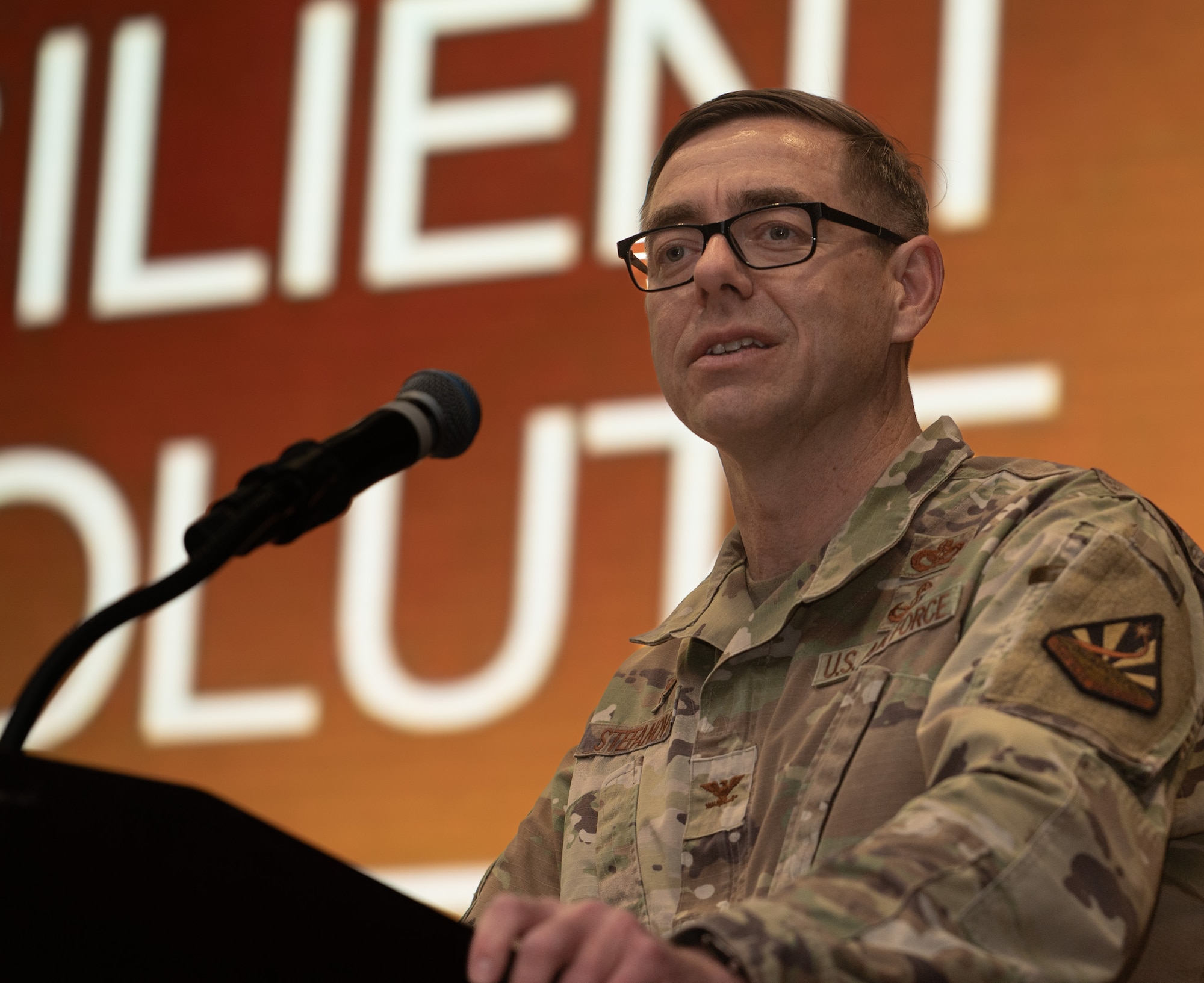 U.S. Air Force Col. Michael Stefanovic, Joint Base McGuire-Dix-Lakehurst and 87th Air Base Wing commander, presents opening remarks at the JB MDL Month of the Military Child Proclamation signing at JB MDL, N.J., April 1, 2026. The signing served as a reminder of the strength and resilience military children contain growing up in an armed forces family. (U.S. Air Force photo by Airman 1st Class Haeleigh Bayle)