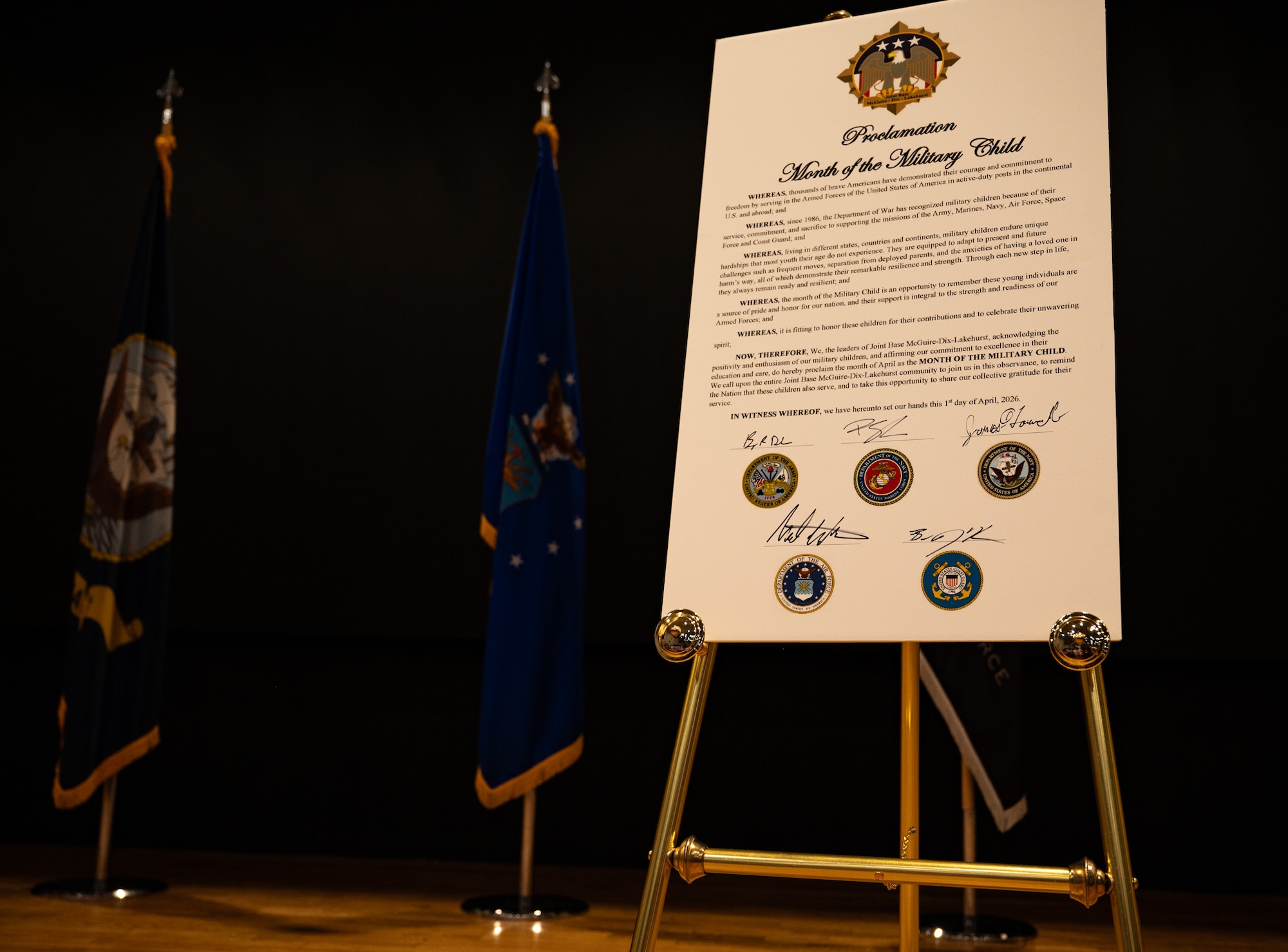 The 2026 Month of the Military Child Proclamation board contains the signatures of Joint Base McGuire-Dix-Lakehurst leadership after the Month of the Military Child Proclamation signing at JB MDL, N.J., April 1, 2026. JB MDL leadership signed the proclamation as a reminder of the important role military children have as they grow up in a military home. (U.S. Air Force photo by Airman 1st Class Haeleigh Bayle)