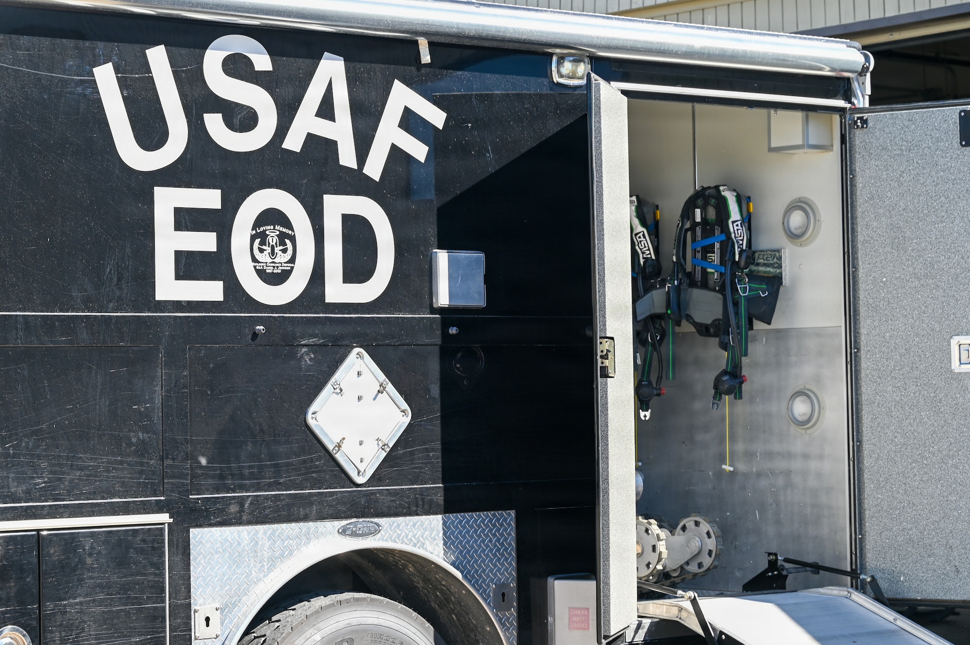 U.S. Air Force 30th Civil Engineer Squadron Explosive Ordnance Disposal vehicle sits outside an EOD facility.