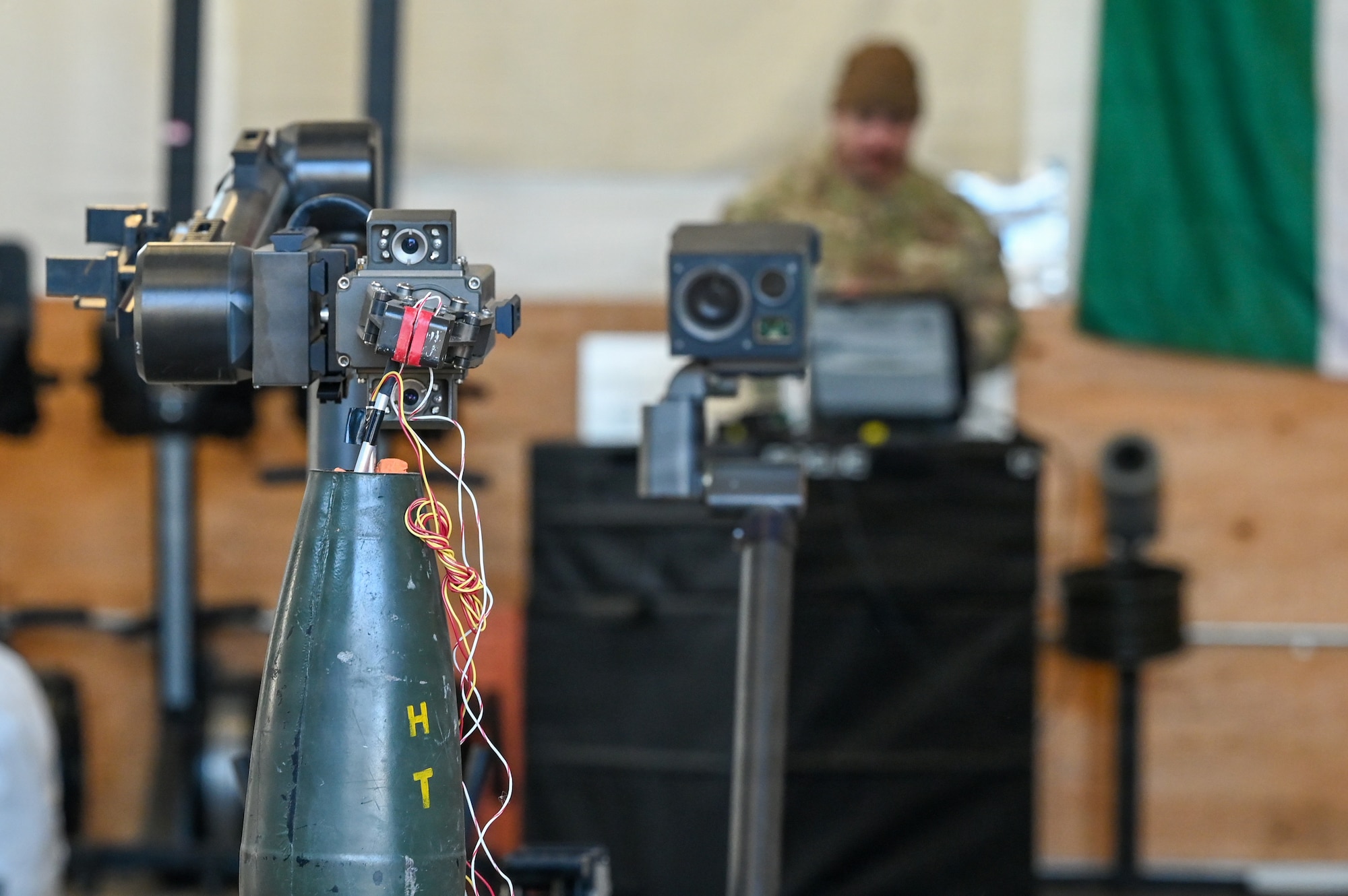 A 30th Civil Engineer Squadron Explosive Ordnance Disposal manned transportable robotic system defuses a mock improvised explosive device at an EOD facility.