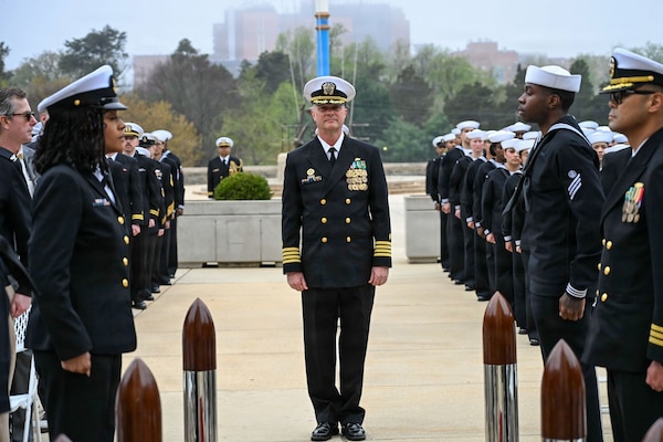 BETHESDA, Md. (Apr. 2, 2026) Capt. Jeffrey J. Klinger, outgoing commanding officer, Navy Medicine Readiness and Training Command (NMRTC) Bethesda, is piped aboard during a combined change of command and retirement ceremony, at Walter Reed National Military Medical Center, Apr. 2, 2026. NMRTC Bethesda’s mission is to maximize warfighter performance through optimized medical readiness tailored to operational requirements; enhance the readiness of the medical force to sustain expeditionary medical capability; and train and develop the Navy Medicine Force. (U.S. Navy photo Mass Communication Specialist Second Class Alec Kramer)