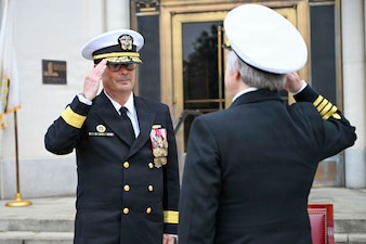 BETHESDA, Md. (Apr. 2, 2026) Capt. Darla Dietrich, commanding officer, Navy Medicine Readiness and Training Command (NMRTC) Bethesda, salutes Rear Adm. Robert J. Hawkins, commander, Naval Medical Forces Atlantic and director, Defense Health Network Atlantic during a combined change of command and retirement ceremony, at Walter Reed National Military Medical Center, Apr. 2, 2026. NMRTC Bethesda’s mission is to maximize warfighter performance through optimized medical readiness tailored to operational requirements; enhance the readiness of the medical force to sustain expeditionary medical capability; and train and develop the Navy Medicine Force. (U.S. Navy photo Mass Communication Specialist Second Class Alec Kramer)