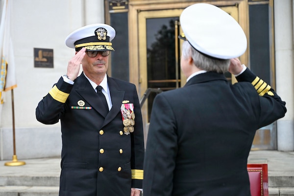 BETHESDA, Md. (Apr. 2, 2026) Capt. Darla Dietrich, commanding officer, Navy Medicine Readiness and Training Command (NMRTC) Bethesda, salutes Rear Adm. Robert J. Hawkins, commander, Naval Medical Forces Atlantic and director, Defense Health Network Atlantic during a combined change of command and retirement ceremony, at Walter Reed National Military Medical Center, Apr. 2, 2026. NMRTC Bethesda’s mission is to maximize warfighter performance through optimized medical readiness tailored to operational requirements; enhance the readiness of the medical force to sustain expeditionary medical capability; and train and develop the Navy Medicine Force. (U.S. Navy photo Mass Communication Specialist Second Class Alec Kramer)