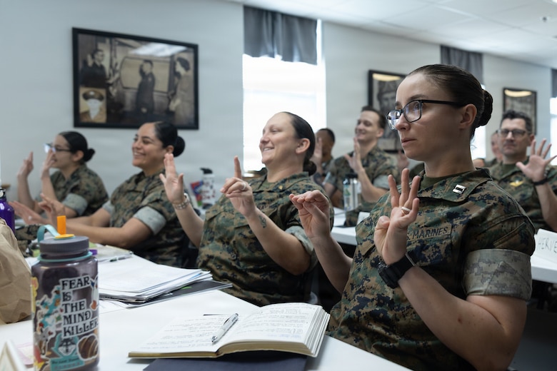 U.S. Marines and Sailors attending the Operational Stress Control and Readiness training participate in an interactive activity during an OSCAR core master trainer course, on Marine Corps Base Camp Lejeune, North Carolina, March 26, 2026