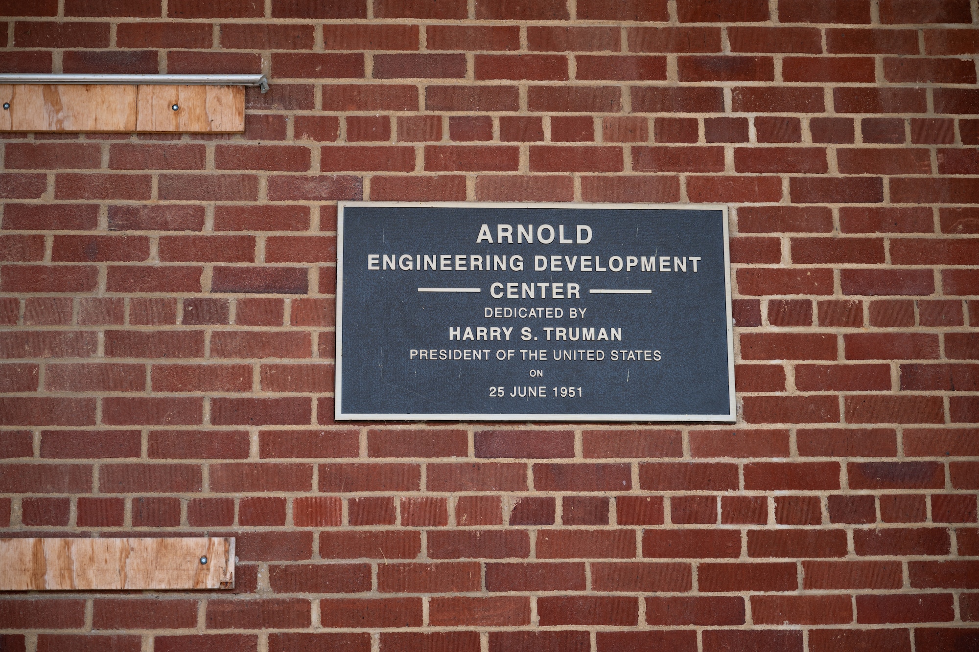 President Harry S. Truman inaugurates Arnold Air Force Base in 1951, speaking from the platform of its very first building. Seventy-five years later, this historic structure continues to serve as a crucial logistics hub for the vastly expanded base. (U.S. Air Force photo by Keith Thornburgh)