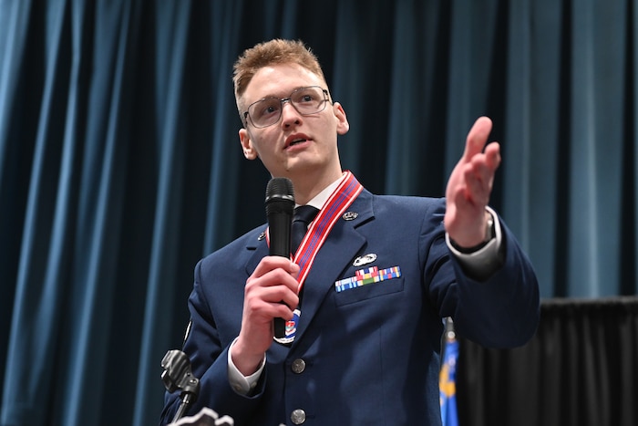 U.S. Air Force Senior Airman Connor Russell, an Airman Leadership School graduate and recipient of the John L. Levitow Award, gives a speech during an ALS graduation ceremony at the William A. Egan Civic and Convention Center in Anchorage, Alaska, March 31, 2026. The graduation serves as a culmination of weeks of intensive academic and physical evaluation, validating each student’s readiness to uphold the high standards of the noncommissioned officer corps. (U.S. Air Force photo by Airman 1st Class Theodore Gowdy)