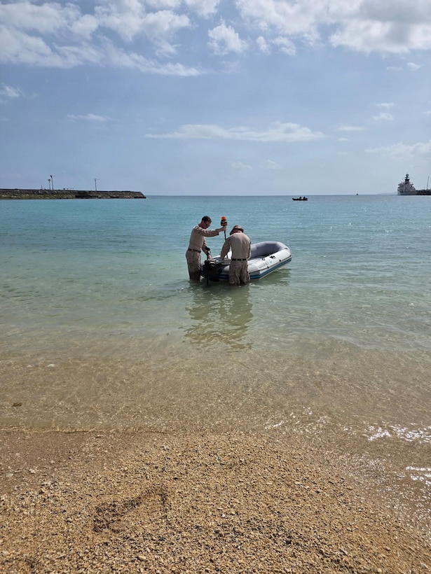 U.S. Marines with Expeditionary Operations Training Group, III Marine Expeditionary Force, test custom-built unmanned surface vessels at Naval Base White Beach, Okinawa, Japan, March 9, 2026. The Marine made systems were evaluated by employing on-board communication systems on rubber rafts in varying sea states by analyzing different haul types and designs. (Courtesy Photo by Expedition Operations Training Group)