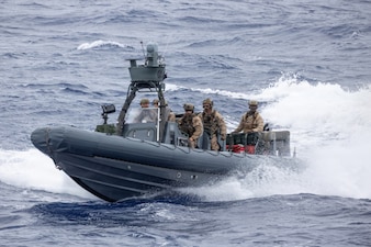 U.S. Marines, with the Maritime Raid Force, 11th Marine Expeditionary Unit, operate a rigid-hull inflatable boat in the Pacific Ocean, April 2, 2026. The 11th MEU is currently underway aboard the Boxer Amphibious Ready Group in the U.S. 3rd Fleet area of operations demonstrating the United States’ long-term commitment to a free and open Indo-Pacific. (U.S. Marine Corps photo by Cpl. Avery Wayland)