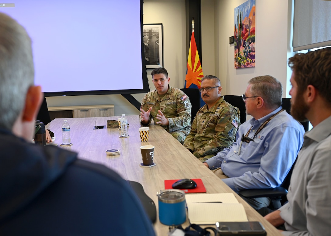 U.S. Space Force Maj. Kevin Aneshansley, Space Forces Southern exercises and training director, speaks with representatives from the University of Arizona’s Kyl Institute for National Security, in Tucson, Arizona, April 2, 2026. Aneshansley explained how a partnership would bring access to critical training and technologies needed to counter non-hemispheric actors in U.S. Southern Command’s area of responsibility. (U.S. Air Force photo by Staff Sgt. Abbey Rieves)