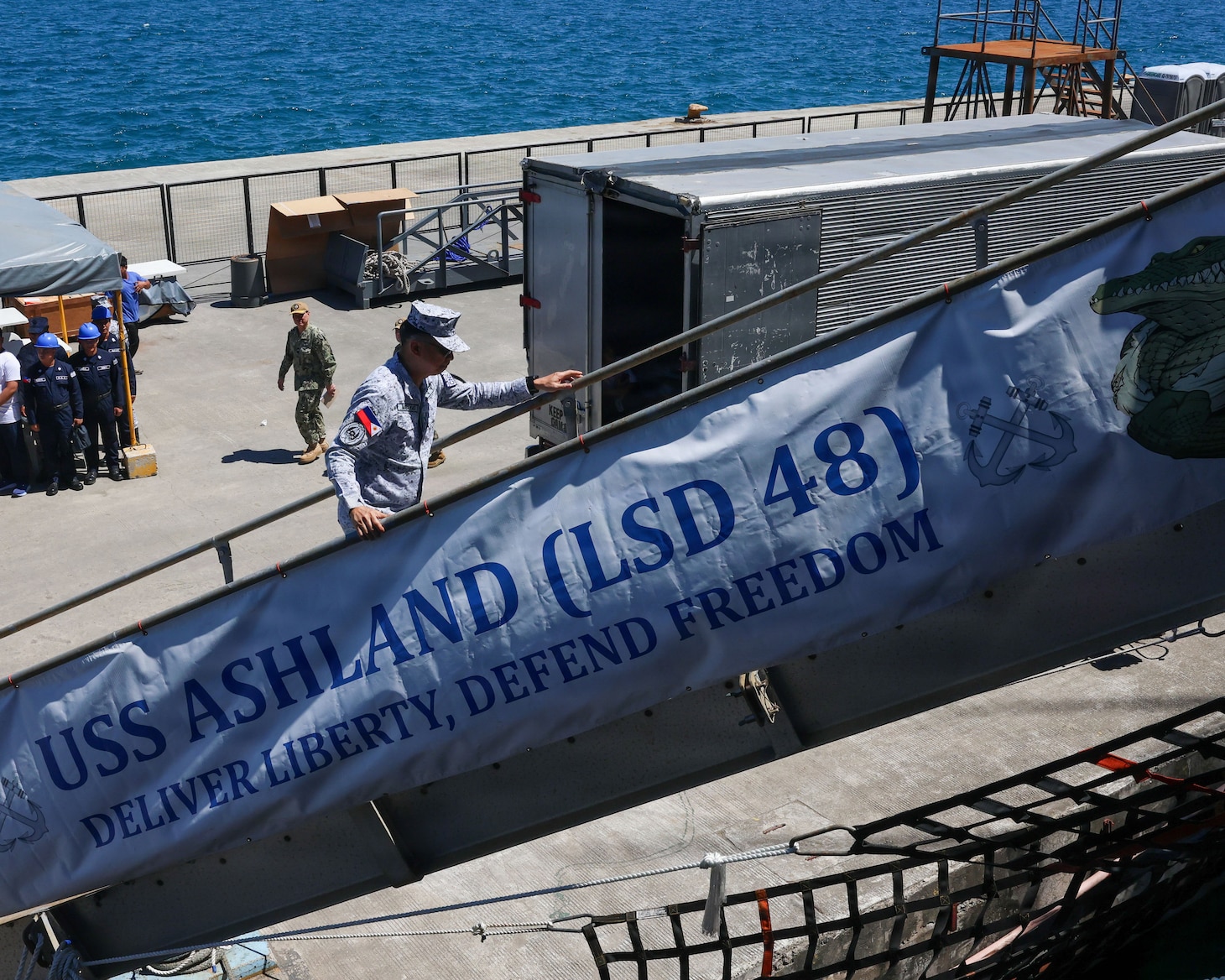 Philippine Navy Rear Adm. Juario C. Marayag, Commander, Naval Sea Systems Command, boards Whidbey Island-class dock landing ship USS Ashland (LSD 48) as part of ship wartime repair and maintenance exercise (SWARMEX) in Cebu, Philippines, March 25, 2026.