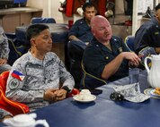 Cmdr. Adam Peeples, commanding officer of Whidbey Island-class dock landing ship USS Ashland (LSD 48) [right], speaks to Philippine Navy Rear Adm. Juario C. Marayag, Commander, Naval Sea Systems Command, about ship wartime repair and maintenance exercise (SWARMEX) during a visit to the ship in Cebu, Philippines, March 25, 2026.