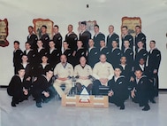 Seaman Robert ‘Brian’ Conner (top row, forth from the left) stands with classmates from his 1997 Tech Core School, the precursor to ET ‘A’ School.  (Courtesy photo provided by Capt. Conner / RELEASED)