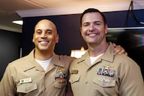 Cmdr. Robert ‘Brian’ Conner stands with shipmate Lt. Cmdr. Patrick Jones at Conner’s promotion ceremony in 2019.  (Courtesy photo provided by Capt. Conner / RELEASED)