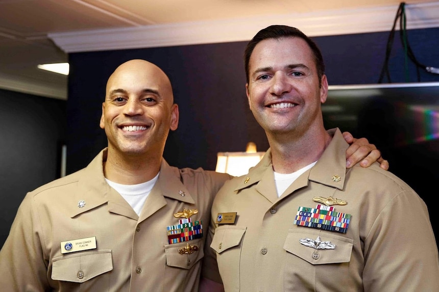 Cmdr. Robert ‘Brian’ Conner stands with shipmate Lt. Cmdr. Patrick Jones at Conner’s promotion ceremony in 2019.  (Courtesy photo provided by Capt. Conner / RELEASED)