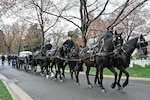 A horse-mounted honor guard draws the casket of Brig. Gen. Clarence “Bud” Anderson during his interment at Arlington National Cemetery in Arlington, Virginia, March 30, 2026. Anderson, a WWII triple-ace fighter pilot, died May 17, 2024, at the age of 102. (U.S. Air Force photo by Eric Dietrich)