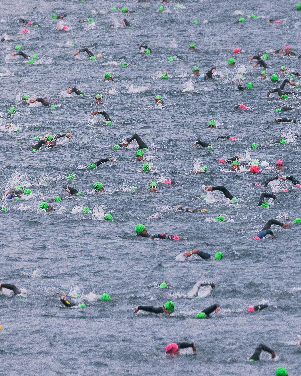 Participants swim during the IRONMAN 70.3 Oceanside race in Oceanside, Calif., March 28, 2026. The race consists of a 1.2-mile swim in Oceanside Harbor, a 56-mile bicycle ride through Marine Corps Base Camp Pendleton and a 13.1-mile run to the Oceanside Pier. The annual event, which travels through a portion of MCB Camp Pendleton, helps the installation maintain strong community relations with the city of Oceanside. (U.S. Marine Corps photo by Sgt. Rafael)