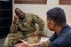 U.S. Air Force Staff Sergeant Linwood Fields, 559 Medical Squadron, noncommissioned officer in charge speaks with Jay Zemeheret, 559 Medical Squadron, licensed clinical social worker at Joint Base San Antonio-Randolph, Texas, March 4, 2026.