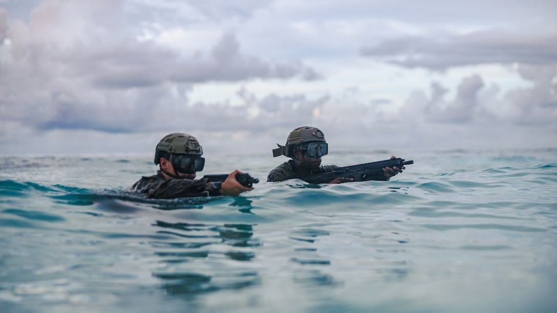U.S. Marines with Force Reconnaissance Platoon, 31st Marine Expeditionary Unit, conduct a simulated reconnaissance and surveillance mission part of a simulated amphibious assault at naval support facility, Diego Garcia, March 24, 2026. The 31st MEU is a persistent, combat credible force operating aboard the ships of the Tripoli Amphibious Ready Group in the U.S. 7th fleet area of operations, routinely interacting and operating with our allies and partners to contribute to deterrence, security, crisis response, and combat operations in the Indo-Pacific region. (U.S. Marine Corps photo by Lance Cpl. Victor Gurrola)