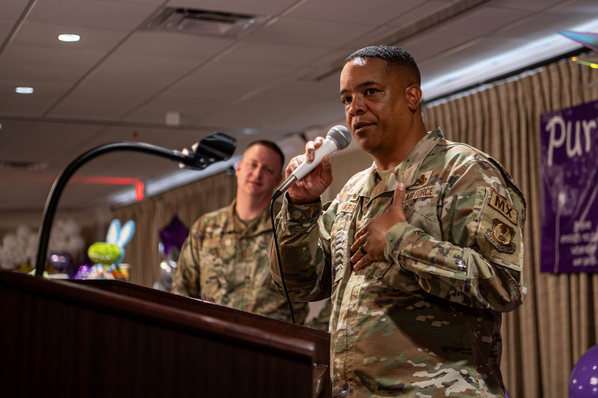 Man speaking at podium