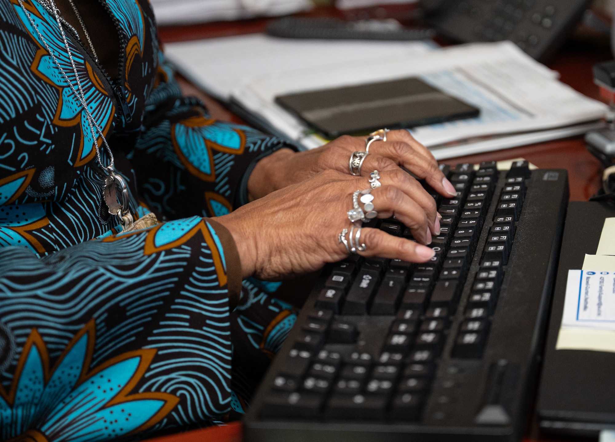 Arlyne Rzepecki, 42d Force Support Squadron Military and Family Readiness Center flight chief, types on a keyboard at Maxwell Air Force Base, Alabama, March 25, 2026.