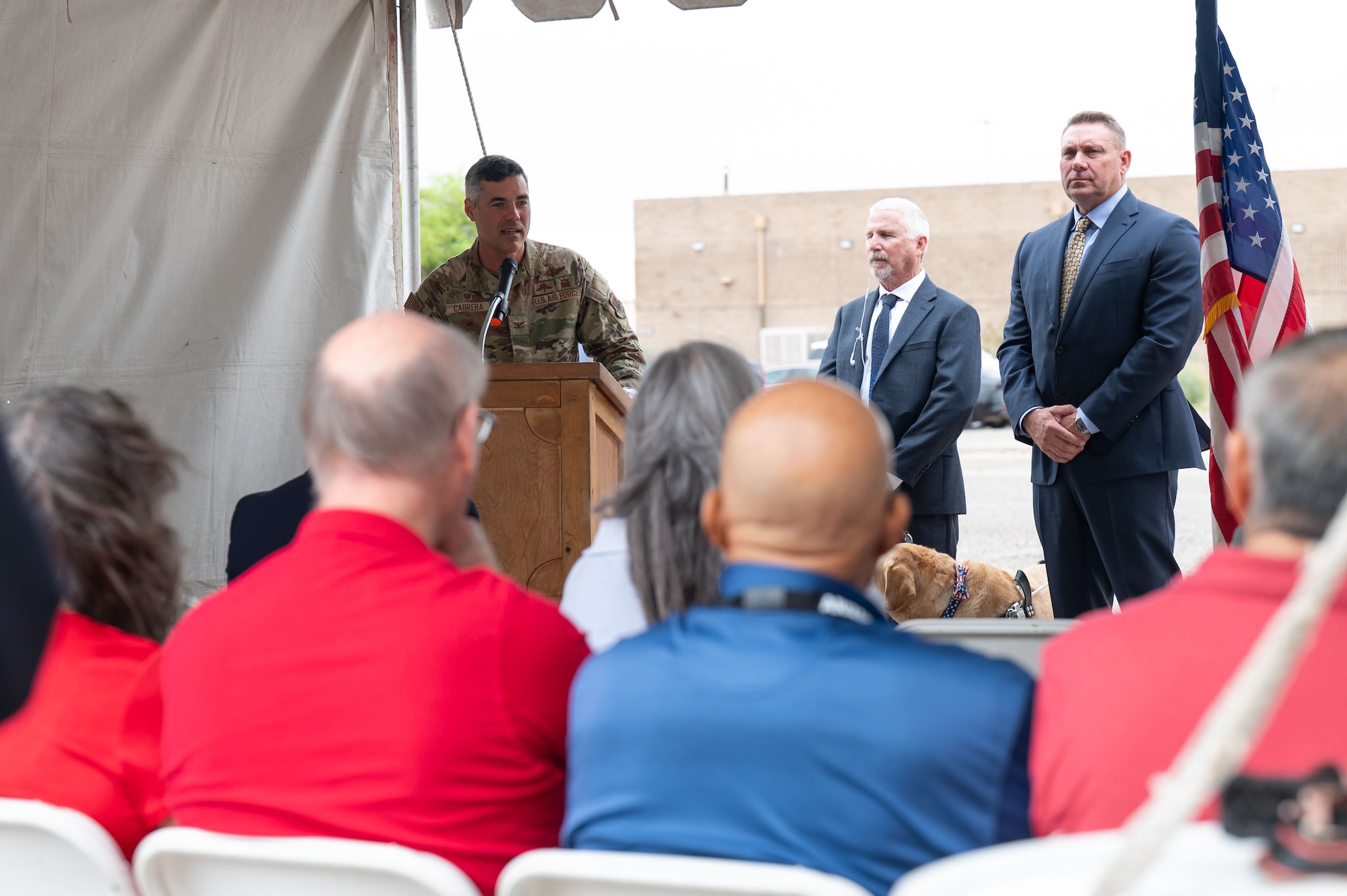 U.S. Air Force Col. Jose Cabrera, 355th Wing commander, speaks during the AbilityOne Base Supply Center 30th Anniversary Ceremony at Davis-Monthan Air Force Base, Arizona, April 6, 2026. Cabrera highlighted the impact of the BSC in supporting DM’s operational needs. (U.S. Air Force photo by Airman 1st Class Jaden Kidd)