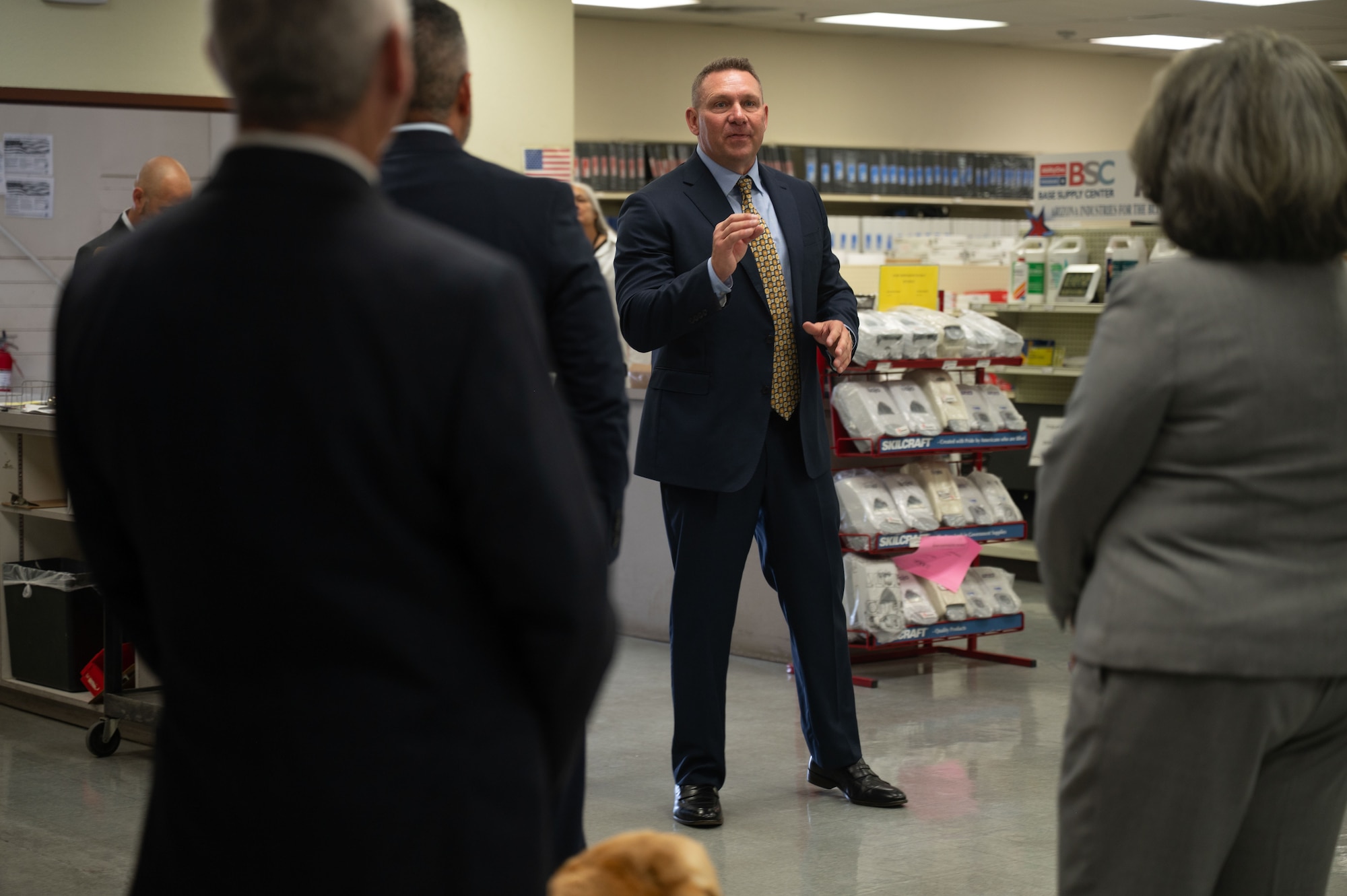 Chris LaFollette, Arizona Industries for the Blind president, speaks on the importance of the Base Supply Center during the AbilityOne BSC 30th Anniversary Ceremony at Davis-Monthan Air Force Base, Arizona, April 6, 2026. LaFollette emphasized the BSC’s role in providing employment opportunities while supporting mission requirements. (U.S. Air Force photo by Airman 1st Class Jaden Kidd)