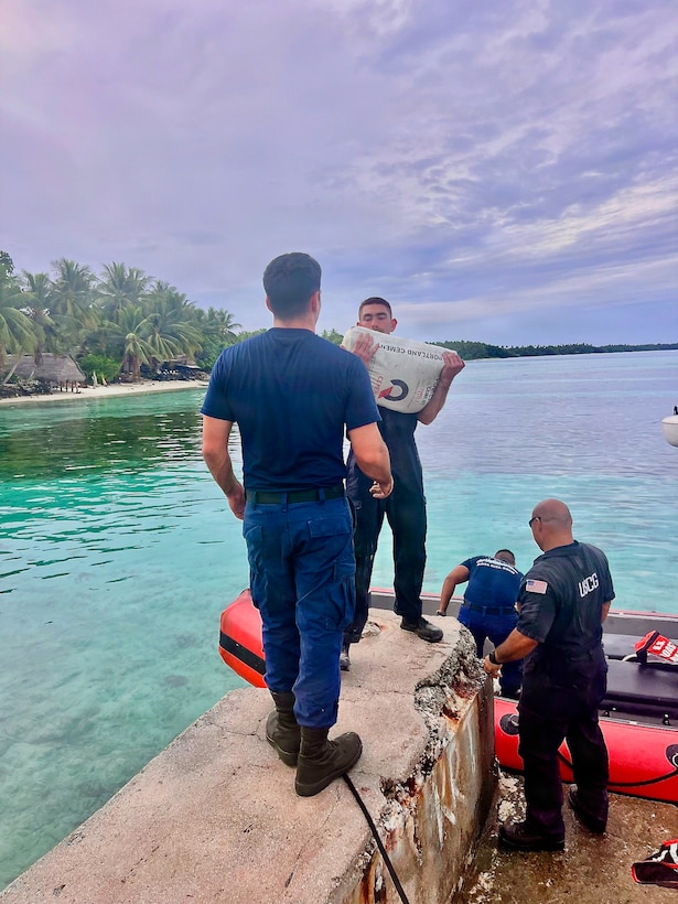 The crew of USCGC Oliver Henry (WPC 1140) delivers cement to the residents of Kapingamarangi Atoll, Federated States of Micronesia, on March 20, 2026, in conjunction with supporting a University of Hawai’i Sea Level Center technician to upgrade a regional NOAA weather monitoring station. The crew of the USCGC Oliver Henry (WPC 1140) returned to Guam on March 29, 2026, closing out a 29-day patrol period that restored a critical tsunami early warning station to a remote Pacific atoll, delivered humanitarian supplies to two island communities, and enforced fisheries laws across more than 4,000 nautical miles. (U.S. Coast Guard photo)