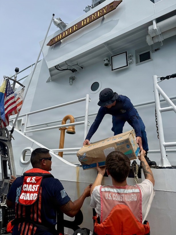 The crew of USCGC Oliver Henry (WPC 1140) delivers supplies to the residents of Kapingmarangi Atoll, Federated States of Micronesia, on March 20, 2026, in conjunction with supporting a University of Hawai’i Sea Level Center technician to upgrade a regional NOAA weather monitoring station. Oliver Henry is the first Fast Response Cutter to make the transit. USCGC Oliver Henry (WPC 1140) returned to Guam on March 29, 2026, closing out a 29-day patrol period that restored a critical tsunami early warning station to a remote Pacific atoll, delivered humanitarian supplies to two island communities, and enforced fisheries laws across more than 4,000 nautical miles. (U.S. Coast Guard photo)