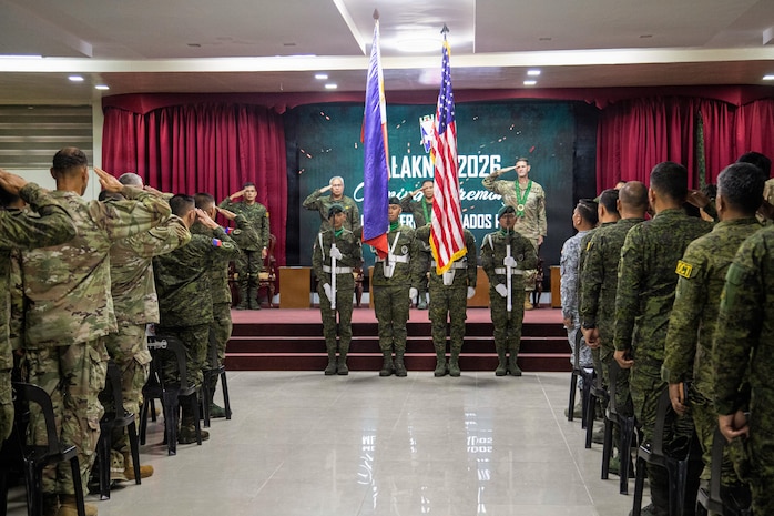 Senior leaders from the U.S. Army and the Armed Forces of the Philippines salute their national colors during the opening ceremony for Exercise Salaknib 2026 at Fort Magsaysay, Philippines, April 6, 2026.