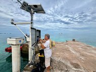 The crew of USCGC Oliver Henry (WPC 1140) supports a University of Hawai’i Sea Level Center technician to upgrade a regional NOAA weather monitoring station on Kapingamarangi Atoll, Federated States of Micronesia, on March 20, 2026, in conjunction with supporting a supply delivery. Oliver Henry is the first Fast Response Cutter to make the transit. USCGC Oliver Henry (WPC 1140) returned to Guam on March 29, 2026, closing out a 29-day patrol period that restored a critical tsunami early warning station to a remote Pacific atoll, delivered humanitarian supplies to two island communities, and enforced fisheries laws across more than 4,000 nautical miles. (U.S. Coast Guard photo)