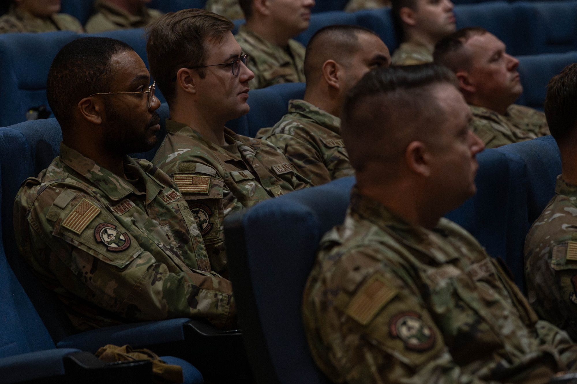 Wolf Pack listen to speaker.