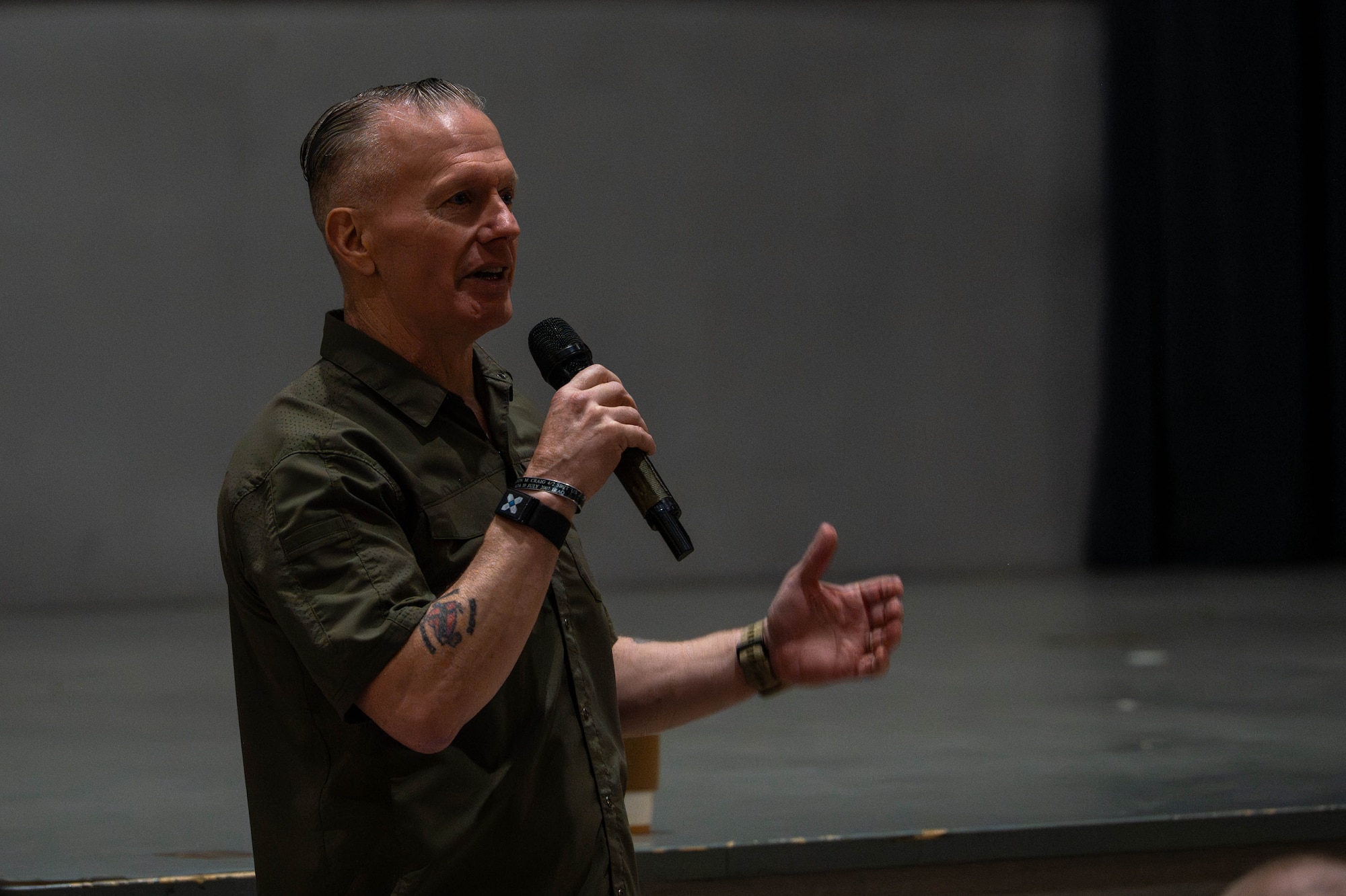 A guest speaker speaks to Wolf Pack.