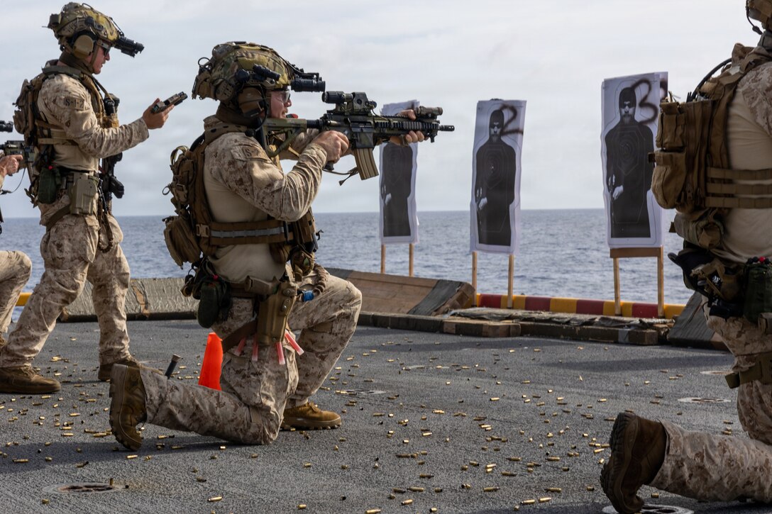A U.S. Marine with Maritime Special Purpose Force, 22nd Marine Expeditionary Unit (Special Operations Capable), sights in with an M27 infantry automatic rifle during a live-fire range aboard Wasp-class amphibious assault ship USS Iwo Jima (LHD 7), while underway in the Caribbean Sea, March 28, 2026. U.S. military forces are deployed to the Caribbean in support of the U.S. Southern Command mission, Department of War-directed operations, and the president’s priorities to disrupt illicit drug trafficking and protect the homeland. (U.S. Marine Corps photo)