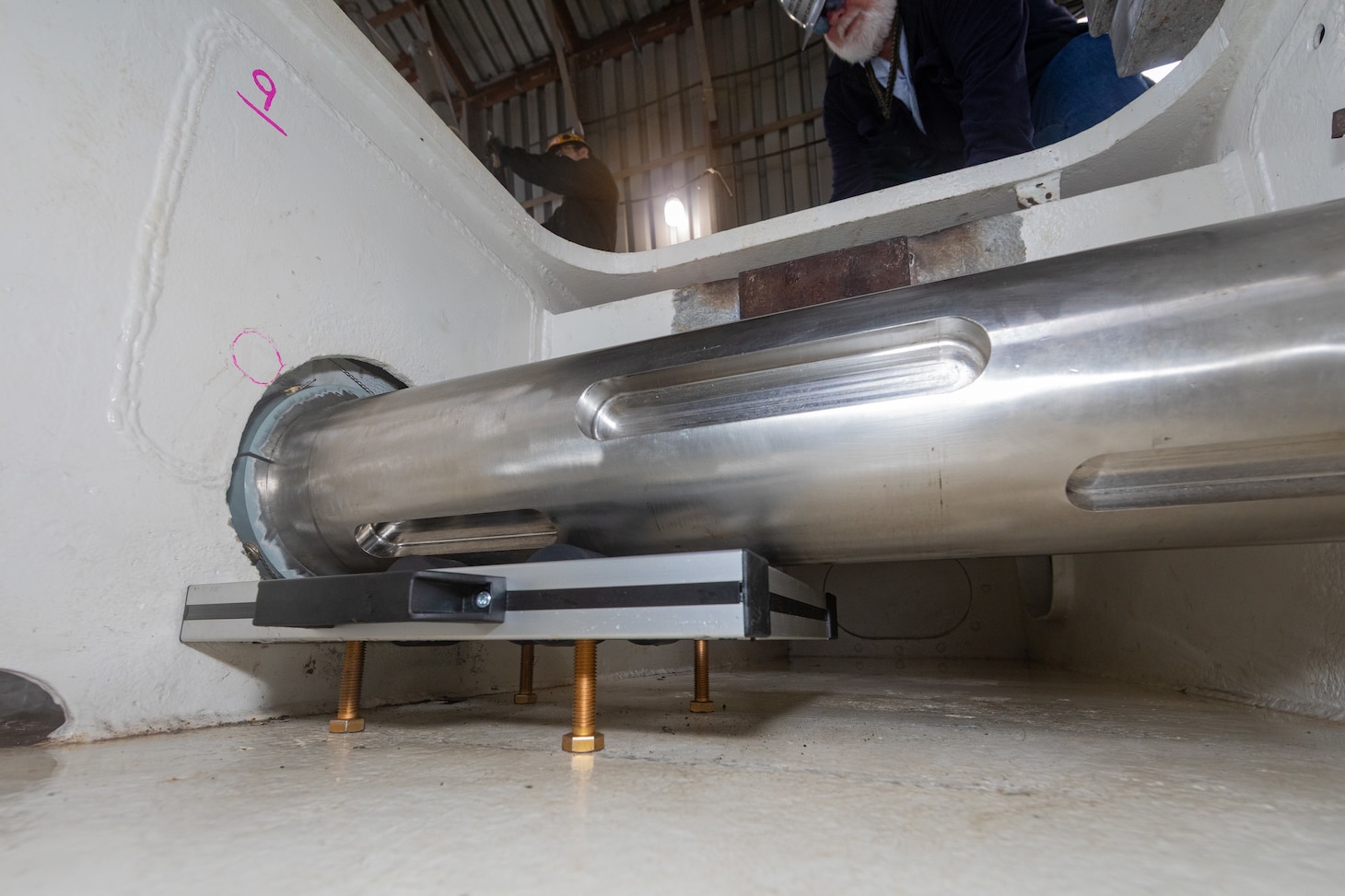 The Jet Blast Deflector Conveyor tool was developed by the Rapid Prototype Center in partnership with the toolmakers, Code 930, and Code 263 in order to lift and rotate the shafts in the jet blast deflector operating gear to eliminate the need for extensive rigging requirements as well as removing the need to cut access points to remove the fixture.