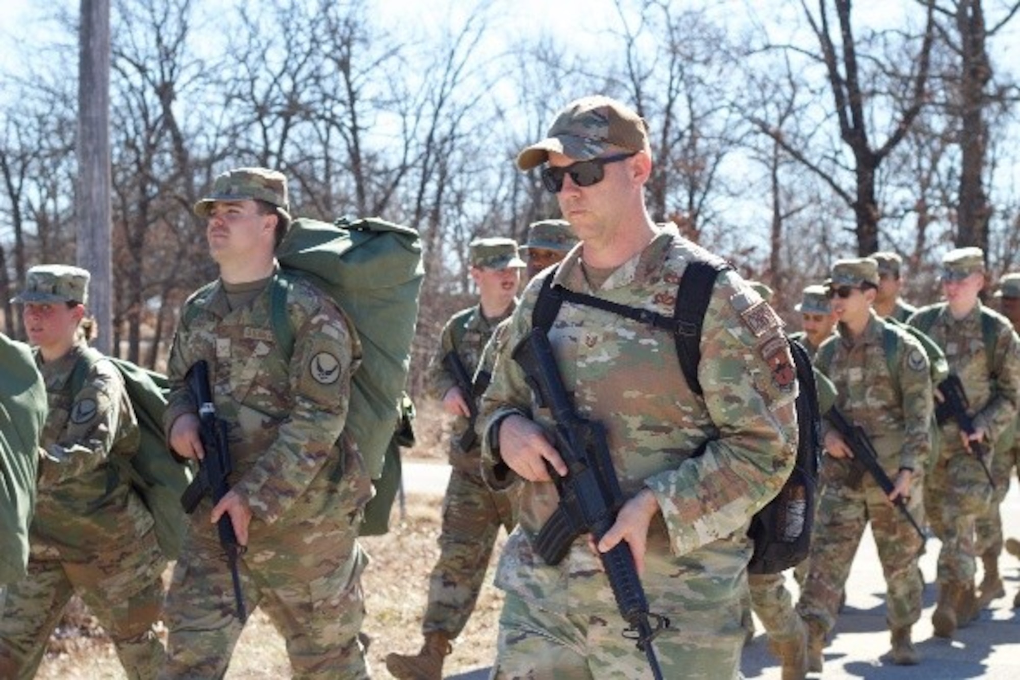 368 TRS Instructor guides his flight during a 5K Ruck Race