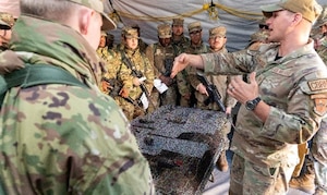 Soldiers from the Combat Training Company demonstrate UAS capabilities to 368 TRS Airmen