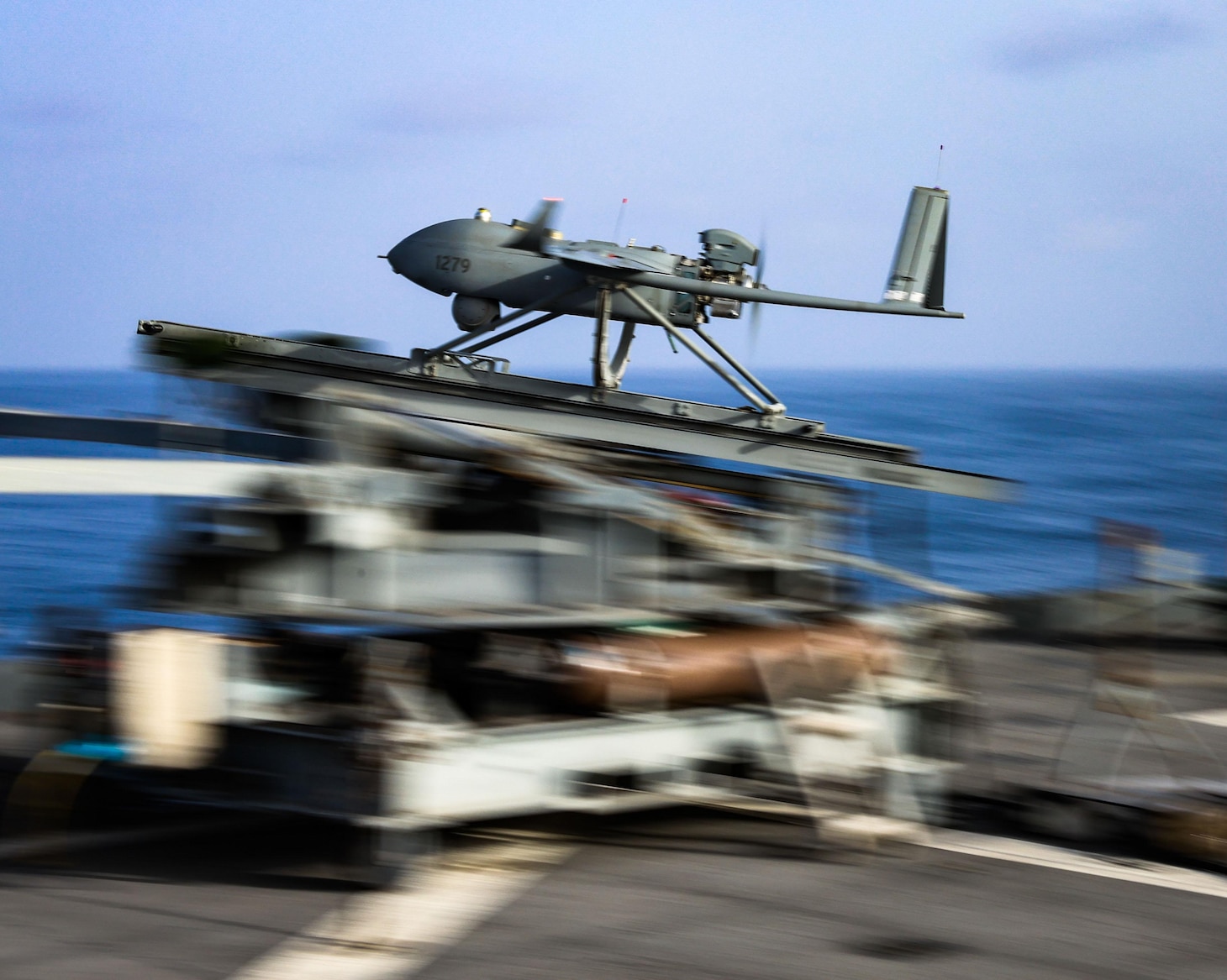 A Textron MQ-19 Aerosonde Unmanned Aircraft System launches from the expeditionary sea base USS Hershel “Woody” Williams (ESB-4).