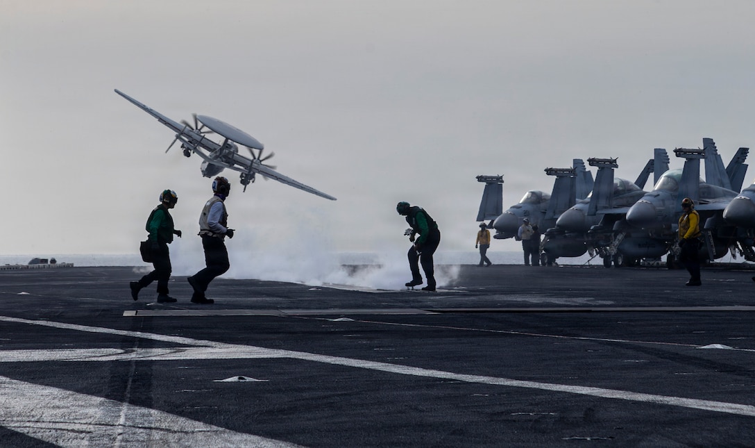 An E-2D Hawkeye, attached to Airborne Command & Control Squadron (VAW) 117, launches from the flight deck of Nimitz-class aircraft carrier USS Abraham Lincoln (CVN 72) during Operation Epic Fury, March 31, 2026. (U.S. Navy photo)