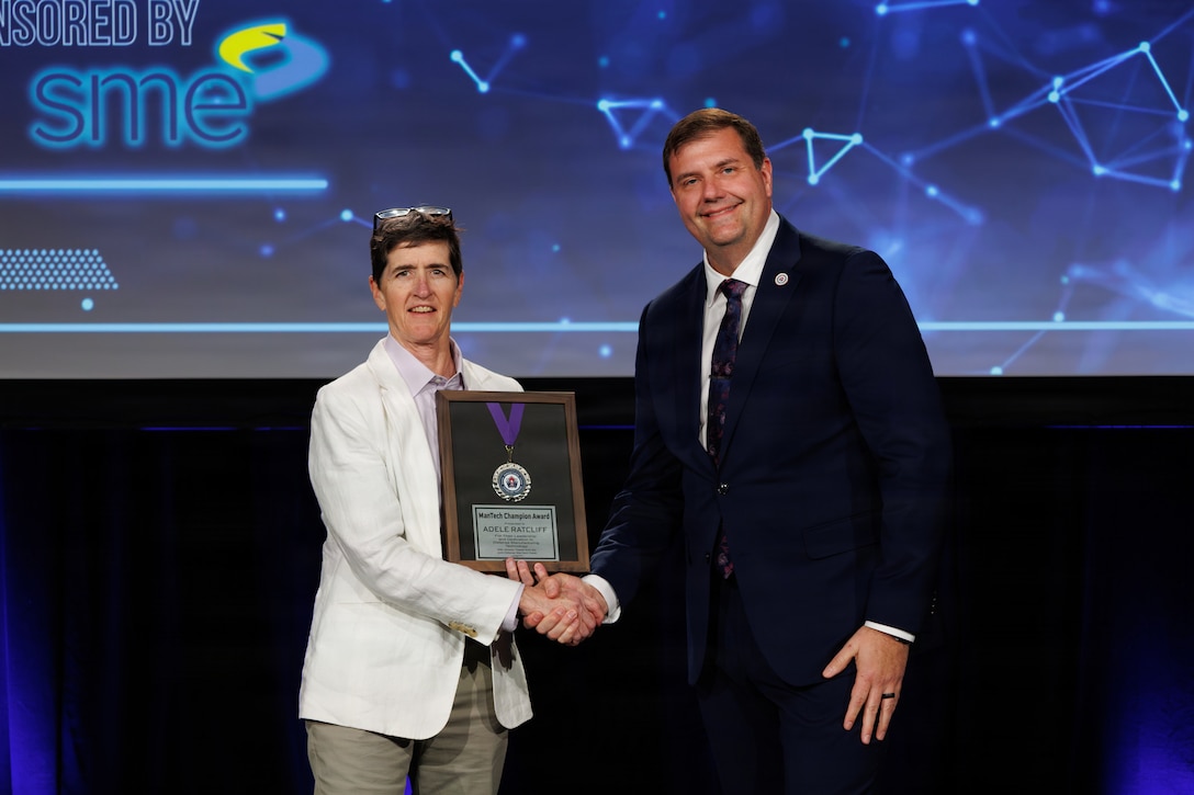 The Office of the Secretary of War Manufacturing Technology Program honored the remarkable achievements of Chris Peters and Adele Ratcliff for their commitment and contributions to defense manufacturing with the 2025 ManTech Champion Awards, March 30, 2026.