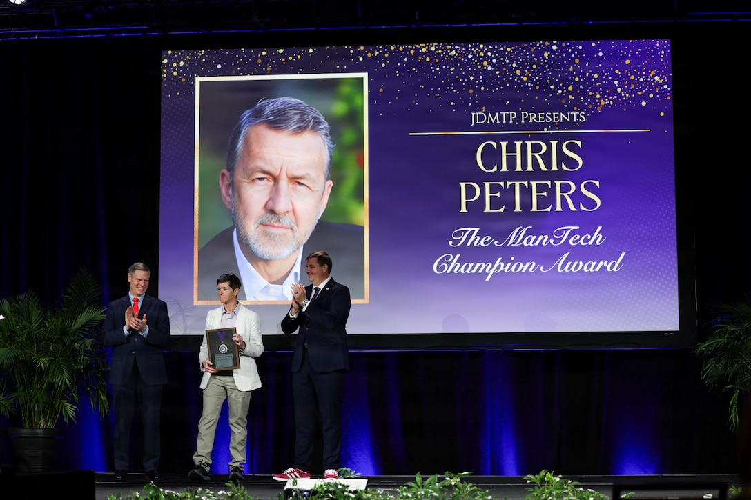 The Office of the Secretary of War Manufacturing Technology Program honored the remarkable achievements of Chris Peters and Adele Ratcliff for their commitment and contributions to defense manufacturing with the 2025 ManTech Champion Awards, March 30, 2026.