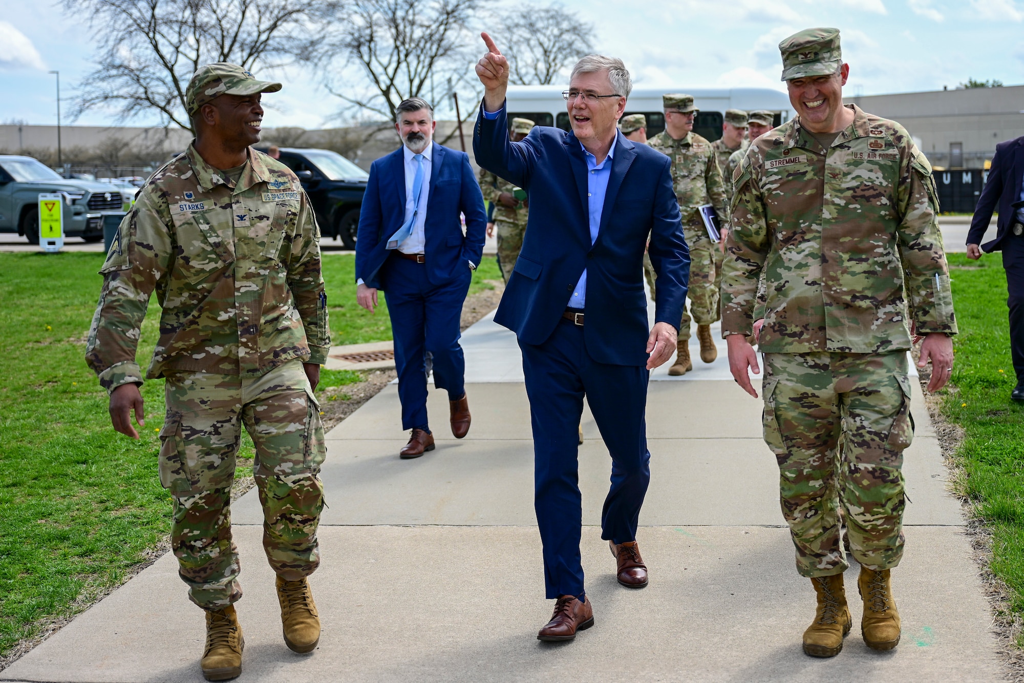 From left, U.S. Space Force Col. Marcus Starks walks with Secretary of the Air Force Troy E. Meink and U.S. Air Force Col. Kenneth Stremmel.