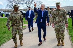 From left, U.S. Space Force Col. Marcus Starks walks with Secretary of the Air Force Troy E. Meink and U.S. Air Force Col. Kenneth Stremmel.