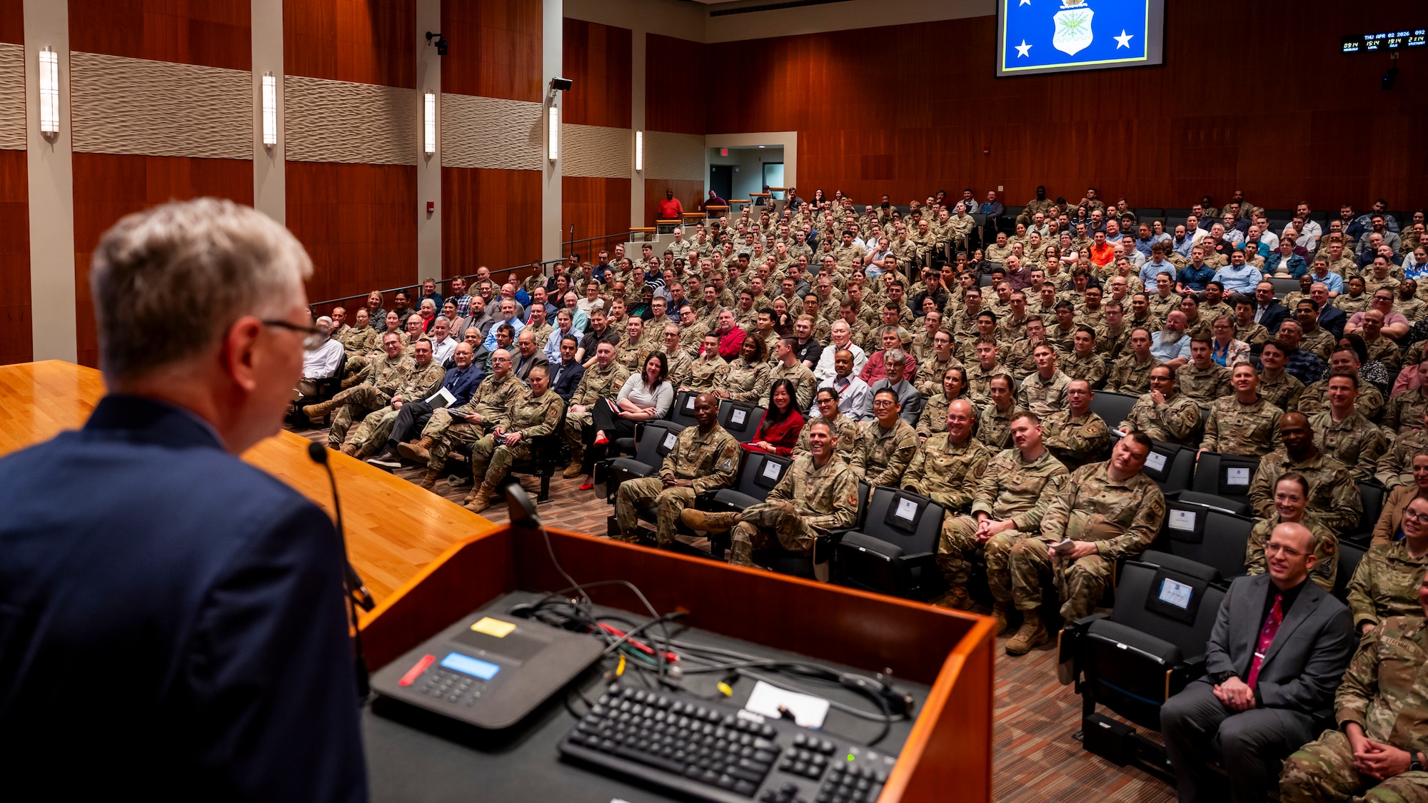 Secretary of the Air Force Troy E. Meink speaks to personnel during an all call.