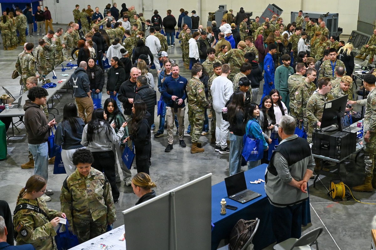 A group of students, families, and teachers meet with members of the Nebraska Air National Guard during the 155th Air Refueling Wing’s Open Hangar, April 1, 2026, at the Nebraska National Guard air base in Lincoln, Nebraska. This year’s event broke attendance records over previous years, with over 450 students in attendance. (U.S. Air National Guard photo by Tech. Sgt. Phil Cowen)