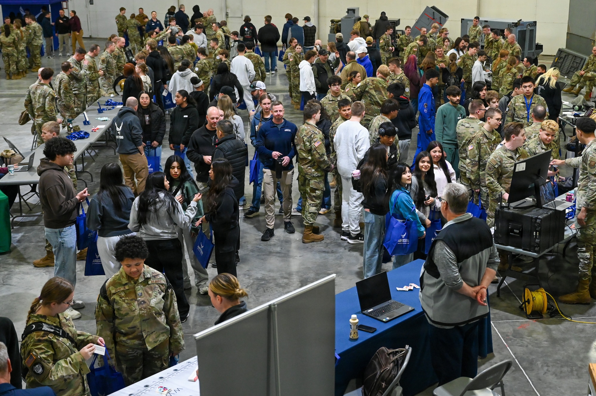A group of students, families, and teachers meet with members of the Nebraska Air National Guard during the 155th Air Refueling Wing’s Open Hangar, April 1, 2026, at the Nebraska National Guard air base in Lincoln, Nebraska. This year’s event broke attendance records over previous years, with over 450 students in attendance. (U.S. Air National Guard photo by Tech. Sgt. Phil Cowen)