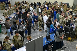 A group of students, families, and teachers meet with members of the Nebraska Air National Guard during the 155th Air Refueling Wing’s Open Hangar, April 1, 2026, at the Nebraska National Guard air base in Lincoln, Nebraska. This year’s event broke attendance records over previous years, with over 450 students in attendance. (U.S. Air National Guard photo by Tech. Sgt. Phil Cowen)
