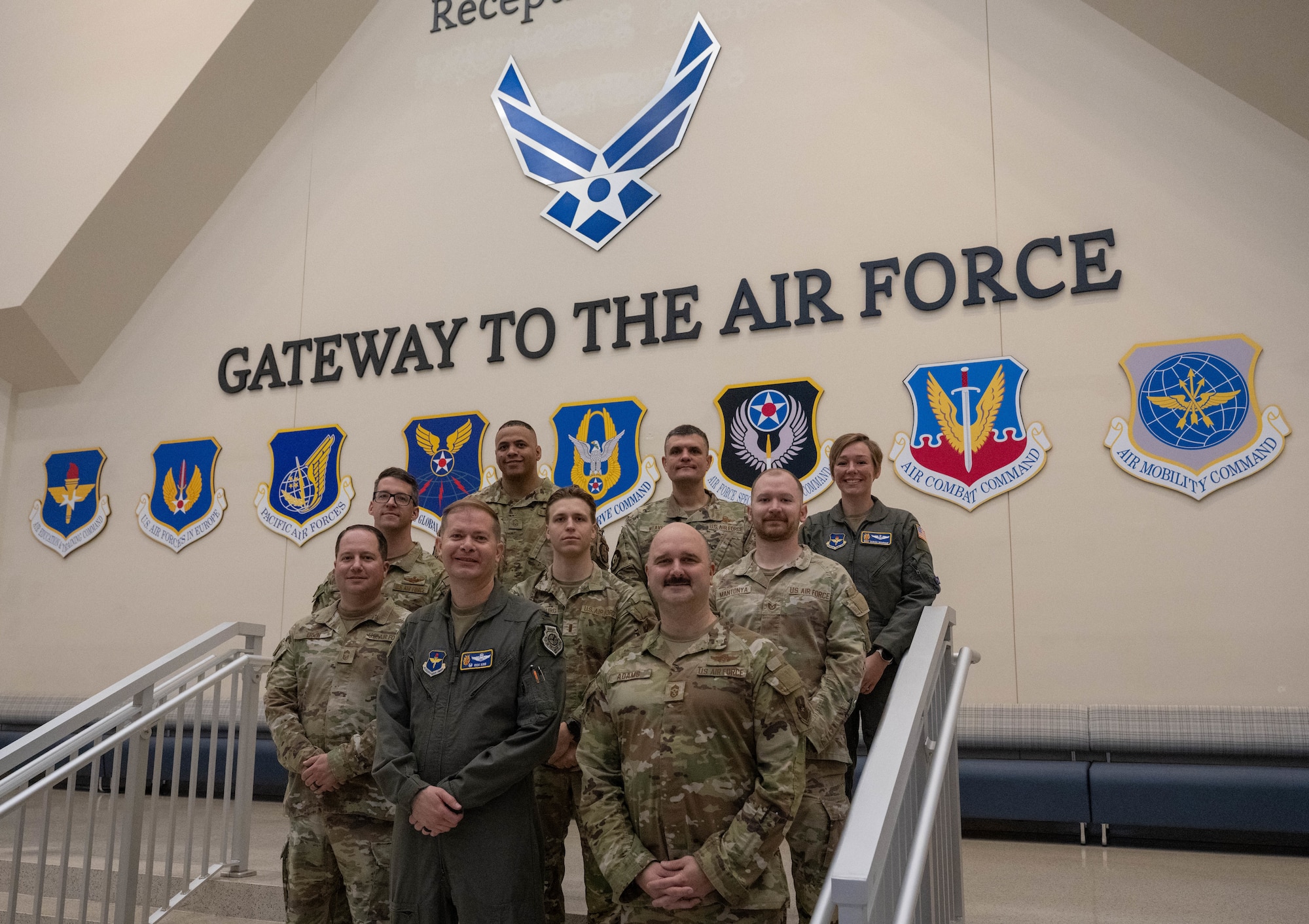 The Altus command team and senior enlisted leaders pose for a photo at the Pfingston Reception Center at Joint Base San Antonio-Lackland, Texas, April 1, 2026. The group attended the Airman’s Run, Coin and Retreat Ceremony, and the Basic Military Training graduation parade, strengthening ties between training and operational units. (U.S. Air Force photo by Airman 1st Class Emma Wright)