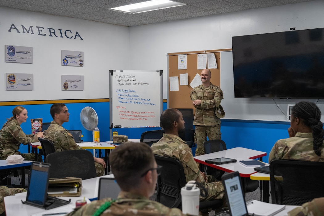 U.S. Air Force Chief Master Sgt. Jonny Adams, 97th Air Mobility Wing command chief, speaks with students at the 344th Training Squadron Career Enlisted Aviator Center of Excellence at Joint Base San Antonio-Lackland, Texas, April 1, 2026. Adams, along with other senior enlisted leaders, spoke with a class, offering guidance and mentorship to newly enlisted Airmen. (U.S. Air Force photo by Airman 1st Class Emma Wright)